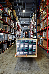 Straight-on image of a forklift in a warehouse